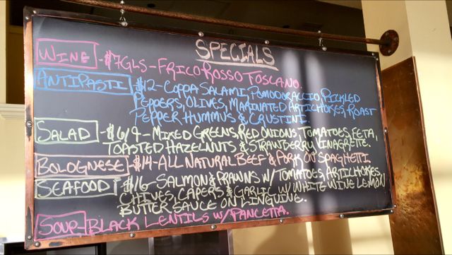 Evening dining ambiance at La Buca Italian Cafe